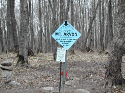 Mount Avron summit sign, "You have reaached Michigan's Highest Point."