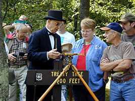 Reenactor portrays Capt. Cram at Treaty Tree site where 1840 Michigan-Wisconsin border was surveyed.