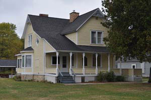 Light yellow Victorian-style house that is now the West Shore Fishing Museum.