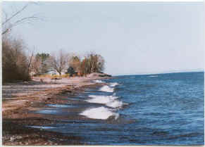  Waves lap at wooded Lake Superior shoreline, legendary Ojibwa maiden site and historic rest stop.