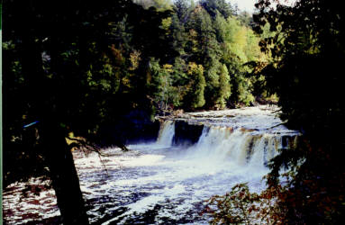  Waterfall on the Presque Isle River, surrounded by forest in Porcupine Mountains Wilderness Park.