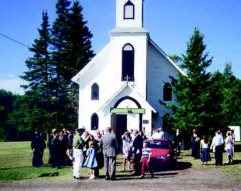  Crowd gathers outside white-steepled St. Mary's Church.